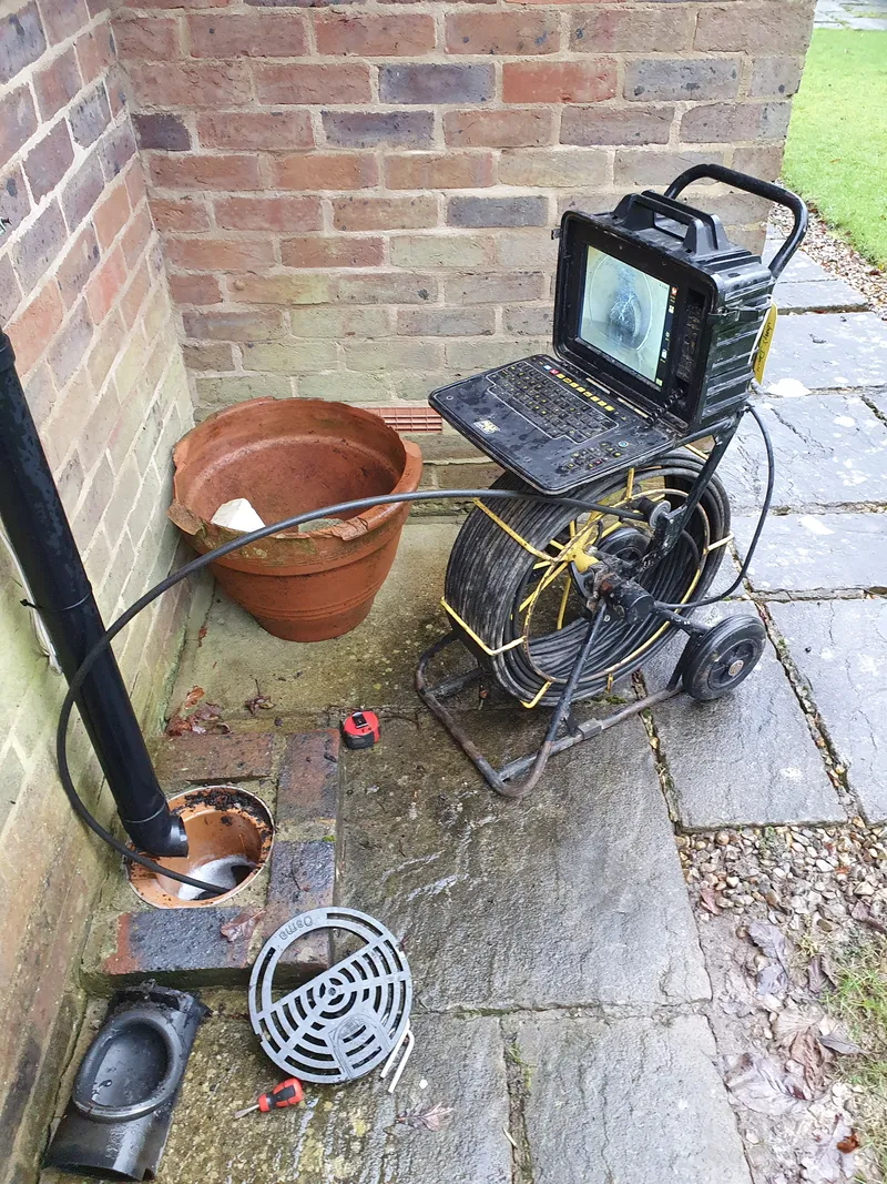 Professional CCTV drain inspection equipment in action